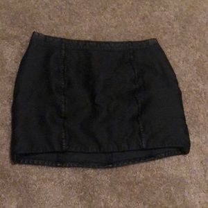 Black leather mini skirt